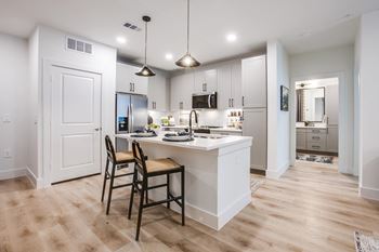 Gourmet prep island with pendant lighting*